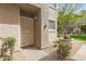 Cozy entryway with desert landscaping, security door and water feature at 10017 E Mountain View Road -- # 1045, Scottsdale, AZ 85258