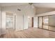 Open and spacious main bedroom with vaulted ceilings, wood-look floors, and access to a private bath at 10017 E Mountain View Road -- # 1045, Scottsdale, AZ 85258