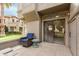 Cozy patio featuring comfortable seating and a sliding glass door for easy indoor-outdoor living at 10017 E Mountain View Road -- # 1045, Scottsdale, AZ 85258