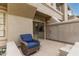 Private patio with comfortable seating, sliding glass door entry, and a convenient outdoor storage closet at 10017 E Mountain View Road -- # 1045, Scottsdale, AZ 85258