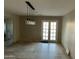 Well-lit dining room featuring travertine tile floor and a modern light fixture at 10249 N 58Th Pl, Paradise Valley, AZ 85253