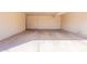 Empty garage with concrete floor and walls at 1118 N Granite Reef Rd, Scottsdale, AZ 85257