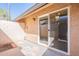 Outdoor patio featuring stucco walls and sliding glass doors at 1118 N Granite Reef Rd, Scottsdale, AZ 85257
