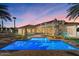 Stunning home with a backyard pool, outdoor bar, and picturesque sunset views at 11319 E Elmhurst Dr, Chandler, AZ 85249