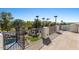 Picturesque rooftop view with lush greenery, mature palm trees, and barbecue area at 11319 E Elmhurst Dr, Chandler, AZ 85249