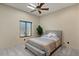 Bedroom with a skylight and neutral decor providing an open and airy feel at 11319 E Elmhurst Dr, Chandler, AZ 85249