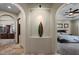 Hallway with modern decor leading to bedroom, bath, and kitchen at 11319 E Elmhurst Dr, Chandler, AZ 85249
