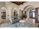 Inviting living room features tiled floors, a ceiling fan, and stylish furnishings at 11319 E Elmhurst Dr, Chandler, AZ 85249