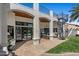 Charming outdoor living area with a spiral staircase and view of the inviting pool beyond at 11319 E Elmhurst Dr, Chandler, AZ 85249