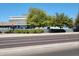 Commercial building with well-maintained landscaping and ample parking at 11564 W Harrison St, Avondale, AZ 85323