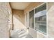 Covered front porch with stone pillars, providing a welcoming entry to the home at 11564 W Harrison St, Avondale, AZ 85323