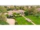 Lush estate featuring manicured lawns, mature landscaping, and a tranquil water feature at 12 E Oakwood Hills Dr, Chandler, AZ 85248
