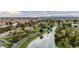 Waterfront community with stunning homes, lush landscaping, and beautiful water views at 12 E Oakwood Hills Dr, Chandler, AZ 85248