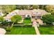 Sprawling estate featuring lush landscaping, well-manicured lawns, and architectural design at 12 E Oakwood Hills Dr, Chandler, AZ 85248