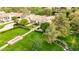 Expansive estate with manicured lawns, lush landscaping, and serene water features at 12 E Oakwood Hills Dr, Chandler, AZ 85248