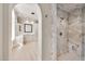 Elegant bathroom with marble shower, custom cabinets, and access to a dual vanity at 12 E Oakwood Hills Dr, Chandler, AZ 85248