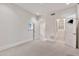 Spacious, sun-lit bedroom with plush carpet, neutral walls, ensuite closet and arched entry doorway at 12 E Oakwood Hills Dr, Chandler, AZ 85248