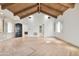 Bright primary bedroom featuring herringbone floors and vaulted ceilings at 12 E Oakwood Hills Dr, Chandler, AZ 85248