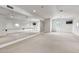 A spacious bonus room with wall to wall mirrors, neutral carpet and recessed lighting at 12 E Oakwood Hills Dr, Chandler, AZ 85248