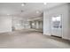 Large and bright bonus room with outdoor access, wall to wall mirrors and recessed lighting at 12 E Oakwood Hills Dr, Chandler, AZ 85248