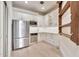Well-equipped kitchen features stainless steel appliances and ample white cabinetry at 12 E Oakwood Hills Dr, Chandler, AZ 85248