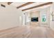 Spacious living room with custom built-ins, large windows, and comfortable seating for relaxation at 12 E Oakwood Hills Dr, Chandler, AZ 85248