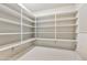 Spacious pantry with open shelving providing ample storage space for food and household items at 12 E Oakwood Hills Dr, Chandler, AZ 85248