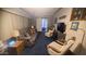 Inviting living room with cozy seating, TV, and stylish decor at 1284 S Sioux Dr # 1284, Apache Junction, AZ 85119