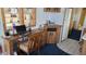 Practical office area with built-in desk, storage, and natural light at 1284 S Sioux Dr # 1284, Apache Junction, AZ 85119