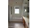 Bright bathroom features a soaking tub, shower, and double sink vanity at 1417 W Lake Mirage Ct, Gilbert, AZ 85233
