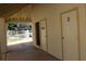 Outdoor restrooms and showers near the community pool, with a glimpse of the neighborhood at 1417 W Lake Mirage Ct, Gilbert, AZ 85233