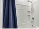 Bathroom with a shower and blue shower curtain at 16573 W Alameda Rd, Surprise, AZ 85387