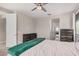 Comfortable bedroom featuring two dressers, a ceiling fan, and neutral tones at 16573 W Alameda Rd, Surprise, AZ 85387