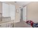bedroom with a crib, closet, and neutral tones at 16573 W Alameda Rd, Surprise, AZ 85387