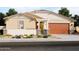 Charming single-story home with a two-car garage, desert landscaping, and inviting curb appeal at 17633 W Pierson St, Goodyear, AZ 85395