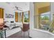 Serene bedroom with a king-size bed, natural light from multiple windows, and stylish decor for a peaceful retreat at 187 E Santa Lucia Ln, Queen Creek, AZ 85140