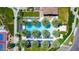 Aerial of pool and patio area featuring palm trees, lounge chairs, and comfortable seating at 187 E Santa Lucia Ln, Queen Creek, AZ 85140