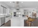 Open kitchen with a large island, stainless appliances, and ample counter space, designed for both cooking and entertaining at 187 E Santa Lucia Ln, Queen Creek, AZ 85140