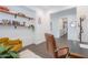 Bright and airy office space with built-in shelving and views out to the home's hallway at 187 E Santa Lucia Ln, Queen Creek, AZ 85140