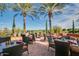 Outdoor dining area overlooking the green spaces and golf course provides a great place to relax at 187 E Santa Lucia Ln, Queen Creek, AZ 85140