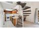 Bright, open kitchen featuring white appliances and light wooden cabinetry at 18811 N 19Th Ave # 3015, Phoenix, AZ 85027