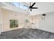 Bright and airy loft space with windows, track lighting, and ceiling fans at 18811 N 19Th Ave # 3015, Phoenix, AZ 85027