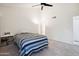 Main bedroom featuring ample light, ceiling fan, and comfortable decor at 18811 N 19Th Ave # 3015, Phoenix, AZ 85027