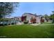 Lush backyard oasis featuring a pool, play area, and beautiful landscaping at 18916 N 98Th St # 3709, Scottsdale, AZ 85255