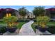 Charming home with lush landscaping, manicured lawn, and a welcoming walkway at 18916 N 98Th St # 3709, Scottsdale, AZ 85255