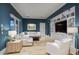 Comfortable living room with custom built-ins and a large sectional sofa at 18916 N 98Th St # 3709, Scottsdale, AZ 85255