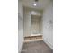 Well-organized mudroom with built-in storage, seating, and convenient hooks for coats and bags at 18916 N 98Th St # 3709, Scottsdale, AZ 85255