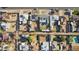 Aerial view of a residential neighborhood featuring modest single-Gathering homes with desert landscaping and paved streets at 2140 W Mitchell Dr, Phoenix, AZ 85015