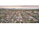 Expansive aerial view capturing a city's residential area, highlighting its orderly streets and diverse housing at 2140 W Mitchell Dr, Phoenix, AZ 85015