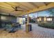 Backyard paver patio with outdoor dining area and desert landscaping at 2140 W Mitchell Dr, Phoenix, AZ 85015